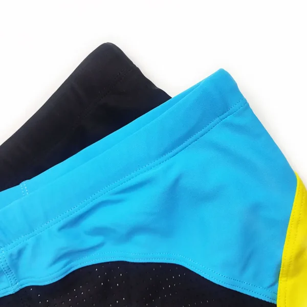 s15229abea138438b9d23d1d873c020727.webp Blue & Black Tight Fit Swim Trunks with Yellow Stripes