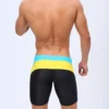 Blue & Black Tight Fit Swim Trunks with Yellow Stripes