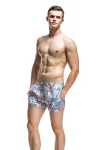 Tropic Floral Blue Surf Trunks